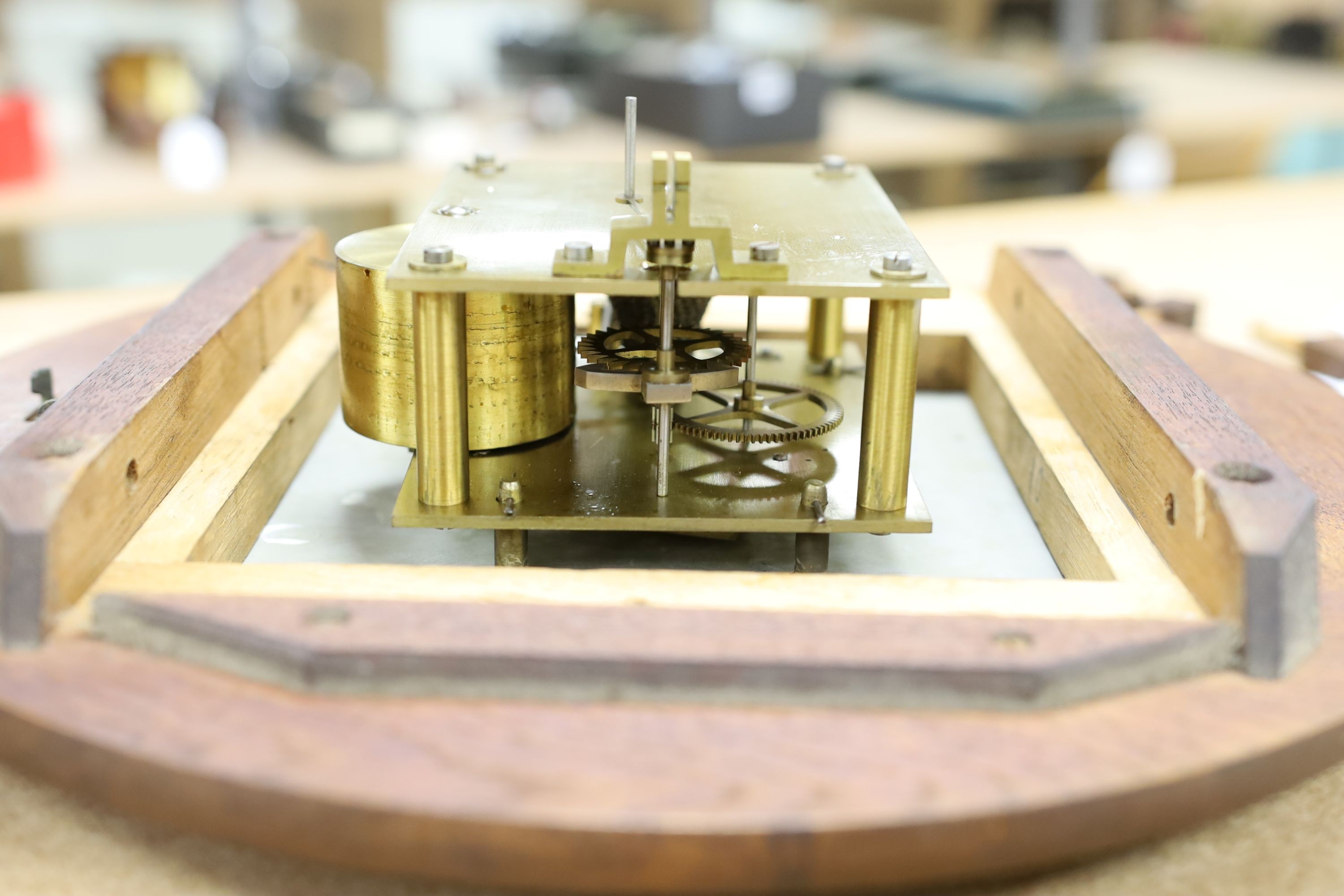 A Victorian oak-cased dial clock, signed JW Benson, London, 38 cms diameter.